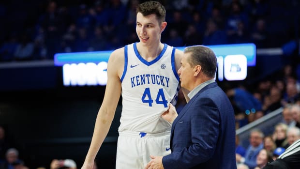 Jan 20, 2024; Lexington, Kentucky, USA; Kentucky Wildcats head coach John Calipari talks with forward Zvonimir Ivisic (44) during the second half against the Georgia Bulldogs at Rupp Arena at Central Bank Center. Mandatory Credit: Jordan Prather-USA TODAY Sports
